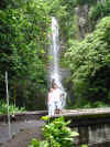 Angie and I in front of a waterfall on the road to Hana