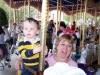 Dillon & Grandmom on the Magic Kingdom carousel