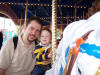 Daddy and Jason on the carousel at Disney
